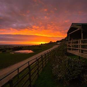 Romantic sunset at Giraffe Lodge overnight safari experience at Port Lympne Hotel and Reserve in Kent